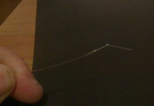 Затем на противоположном конце фтора вяжем такой же простой узелок No. 2. Отрежьте лишний флюрик...